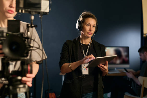 istock Female Director Working on Set And Wearing Headset 2151886067