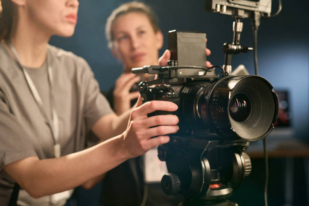 istock Close Up of Woman Operating Digital Camera 2151886082