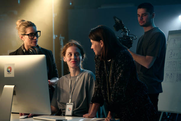 Video Production Crew Reviewing Footage