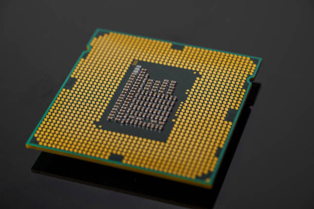 istock Close-up view of a CPU (Central Processing Unit) with visible pins and intricate architecture 2151889115