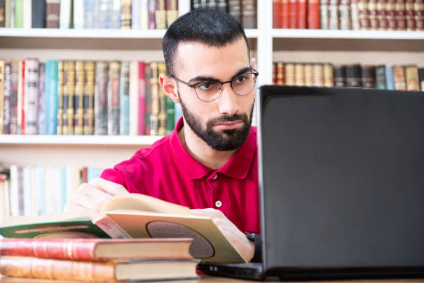 istock Arabic man using a laptop during conferences or meetings for studying and teaching through online channels 2151889966