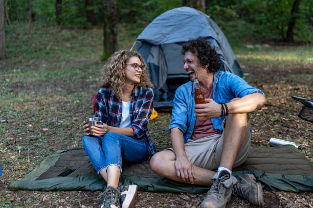 istock Couple camping in the forest 2151892629