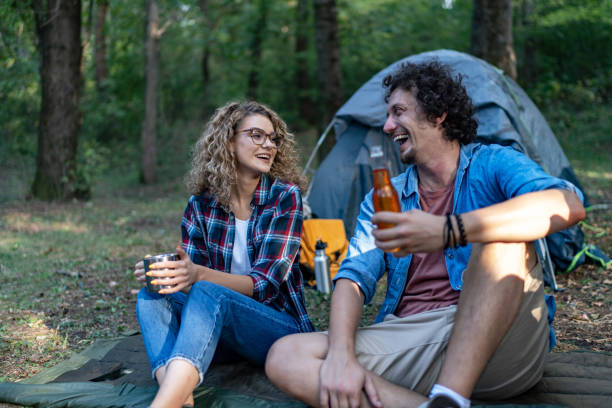 istock Couple camping in the forest 2151892666