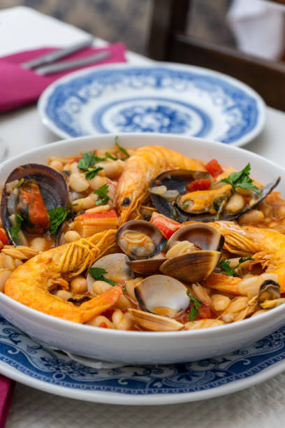 istock A traditional Alentejo restaurant serves a seafood feijoada. 2151893130