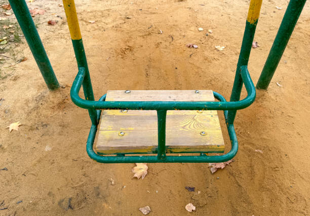 Swings on the playground in autumn.