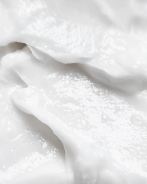 istock White cosmetic face mask texture close-up 2151896106