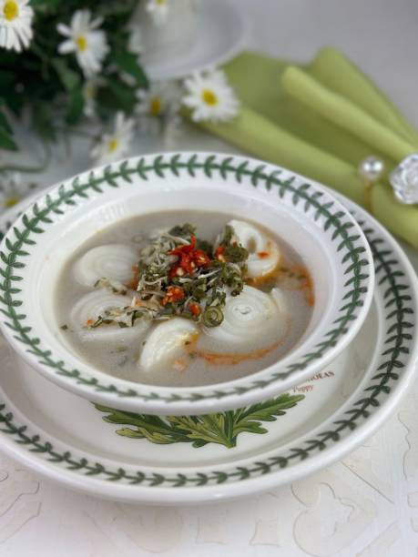 istock laksam or flat rice noodles in fish gravy 2151898016