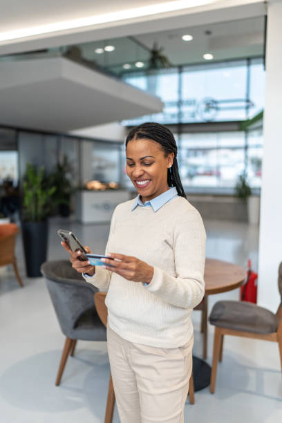 istock Woman using credit card payment 2151899352