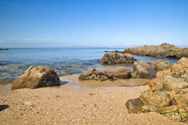 istock Clear blue sea with rocky tide pools 2151899545