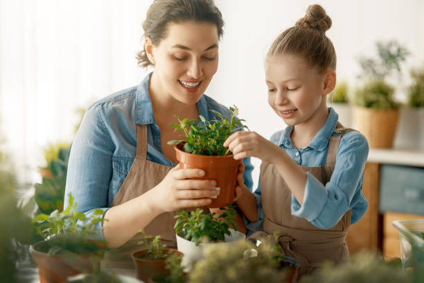 istock Family caring for plants 2151899721