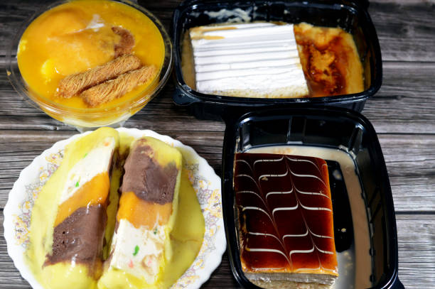 istock Assorted desserts and Ice-cream, sweet Koshary with milk rice pudding, konafa, whipped cream, mixed ice cream, brulee cream and tres leche with whipped cream and lots of different desserts and flavors 2151900334