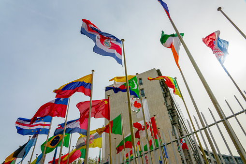 Flags and building of UNESCO (United Nations Educational Scientific and Cultural Organization) in Paris, France