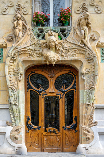 Door of the Lavirotte historical building from 1901,  Art Nouveau architecture landmark in Paris, France