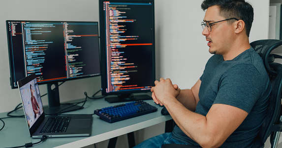 Young Man Software Developers Using Computer To Write Code Application ...