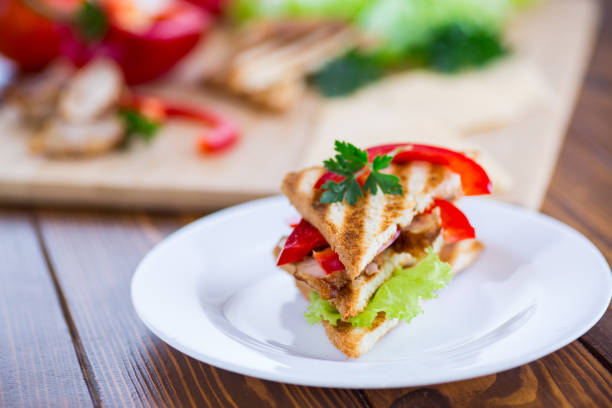 istock fried toast with chicken, salad, greens on a wooden table 2151905046
