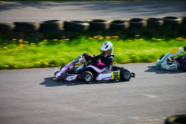 istock Driving go-cart on sports track 2151905931