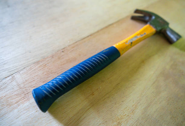 Steel hammer tool with rubber handle