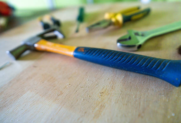 Steel hammer tool with rubber handle