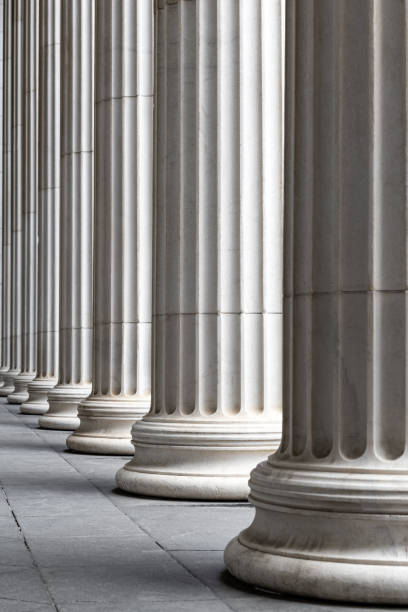 istock fragment of a Greek stone column close-up. stone column 2151912131