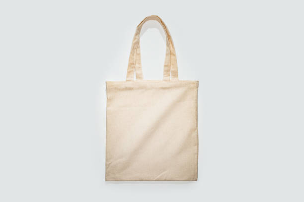 istock Plain Beige Canvas Tote Bag on a Clean White Background 2151912490