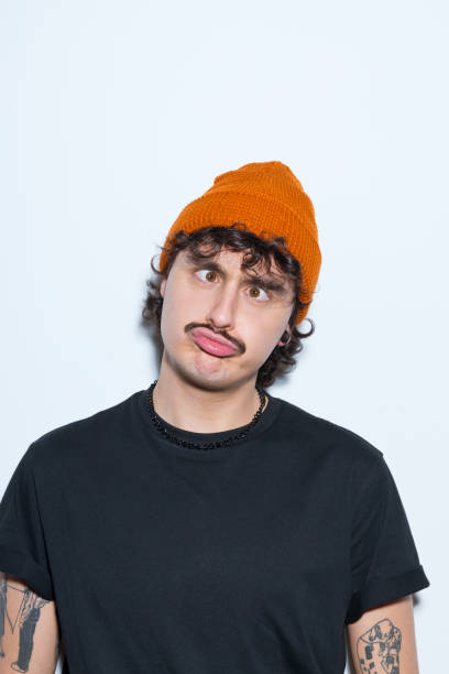istock Portrait of young man squinting 2151914371