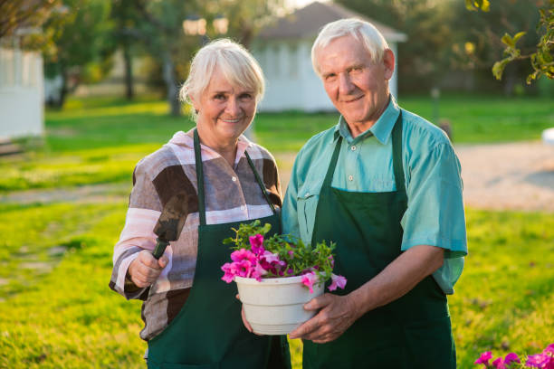 istock Senior couple and flower pot. 2151917435