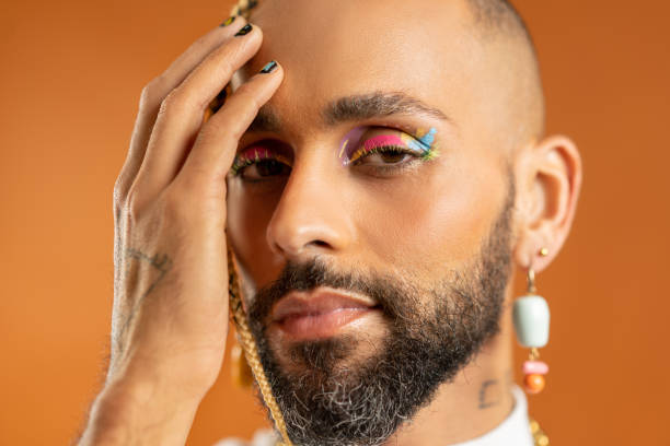 istock Black latin gay man isolated on pink background 2151917868