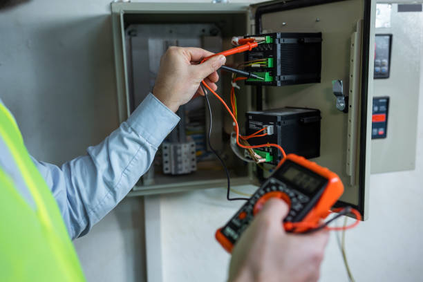 istock working with electric switchboard to check range of voltage working in Main Distribution Boards factory. 2151919115