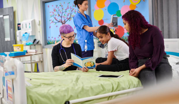 istock paediatrician showing young patient a leaflet 2151921430