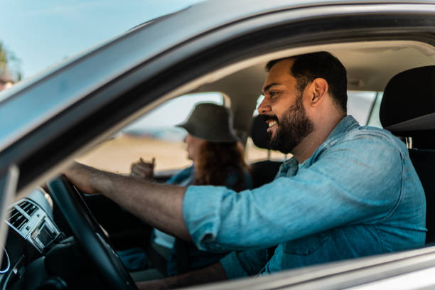 istock Mature man driving a car during a trip 2151927855