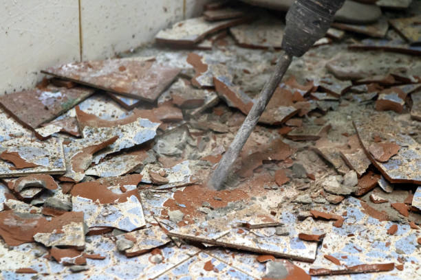 istock A construction worker is using a jackhammer to break up a concrete floor. 2151929925