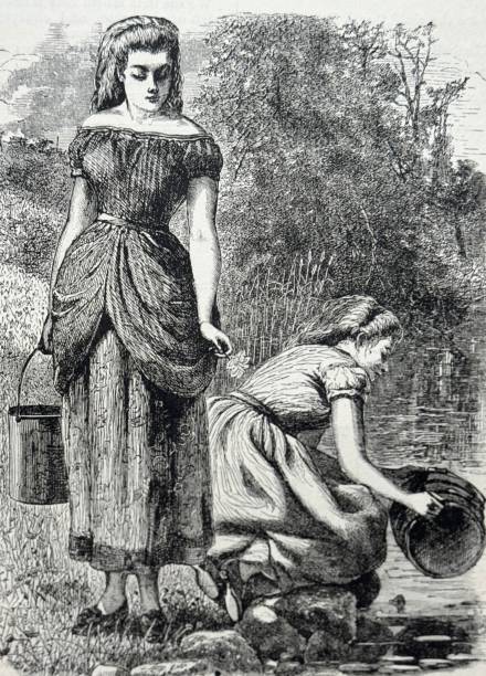 istock Two pretty young women with buckets chasing water by the river 2151931397
