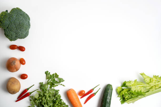 istock Top view flat lay of assorted tropical fresh vegetables with copy space, embodying the concept of healthy eating 2151933914