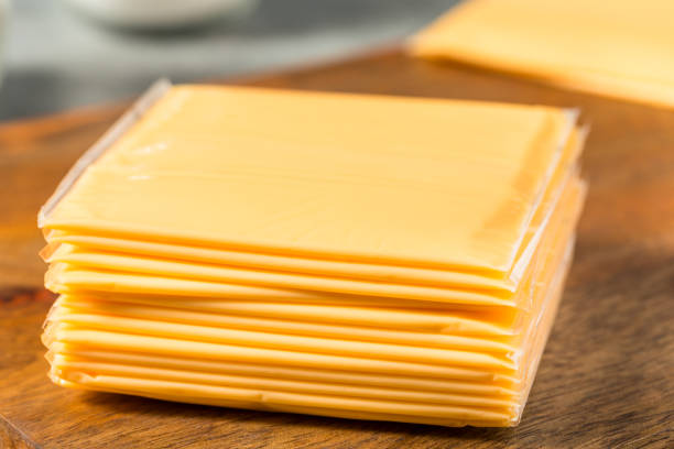 istock Yellow Cheddar American Cheese Singles 2151934454