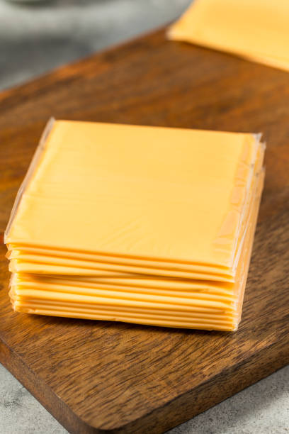 istock Yellow Cheddar American Cheese Singles 2151934995