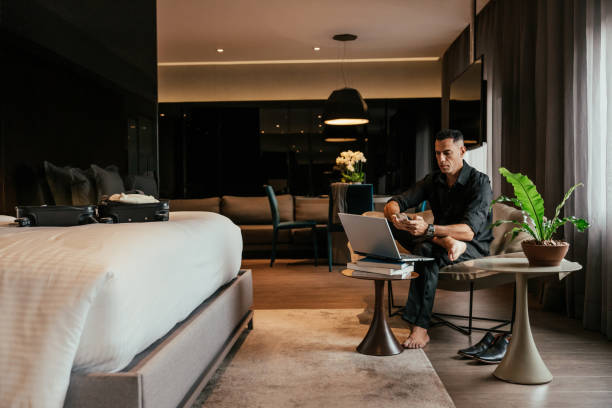 Businessman working in hotel room