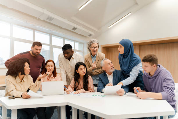 istock Group multiracial business people brainstorming, sharing ideas. Colleagues, coworkers talking 2151937232