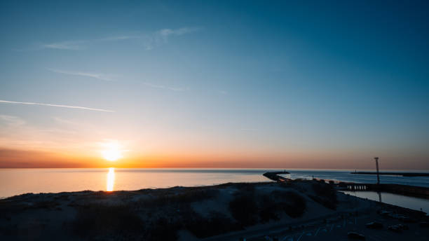 istock The sky is blue and the sun is setting 2151939705