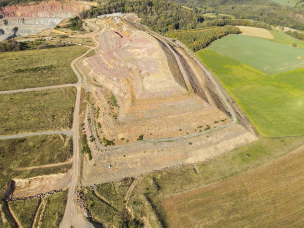 istock View from above on a hill with different rock layers due to mining in the quarry 2151940428