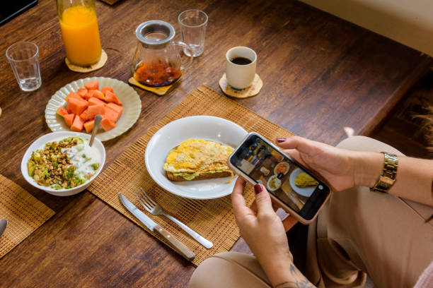 istock Nutritionist photographing your breakfast before eating 2151940693