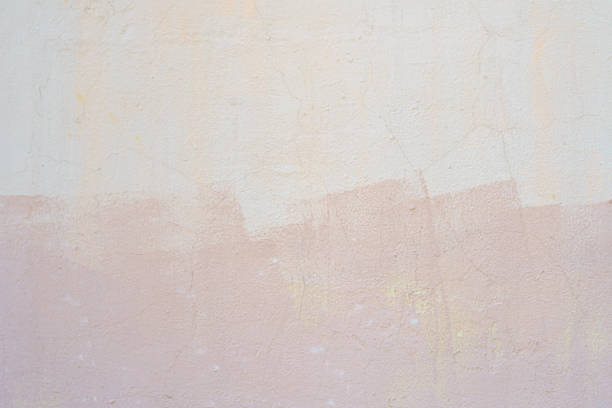 Traces of paint on old white plaster. Abstract construction background.