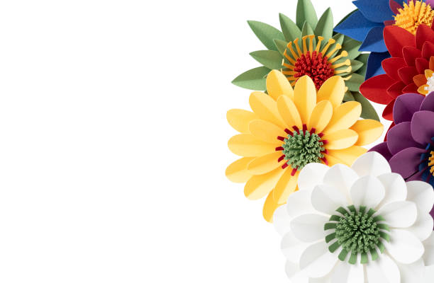 Handmade colorful paper flowers on white background