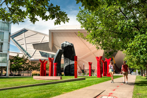 Denver Art Museum Colorado USA Denver, Colorado - September 18, 2023: People walk by the entrance and grounds of the Denver Art Museum and the Monoliths sculpture by Beverly Pepper in the downtown core Colorado USA colorado flag art pictures stock pictures, royalty-free photos & images