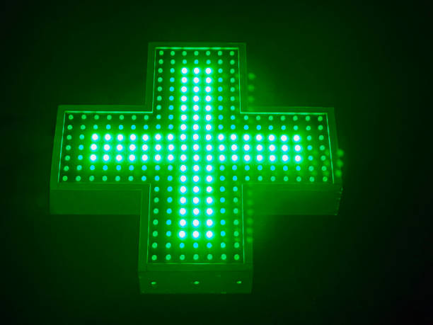 istock Green Pharmacy Led Cross 2151943975