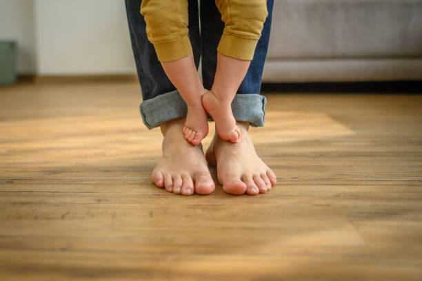 istock Parent and Child Footsteps Together at Home 2151945903