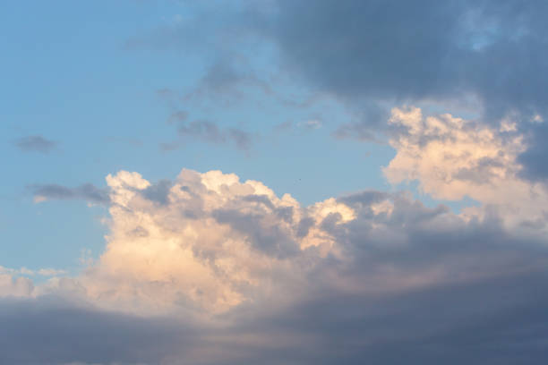 istock Dramatic sunset clouds in a blue sky, dynamic and inspirational themes 2151953928