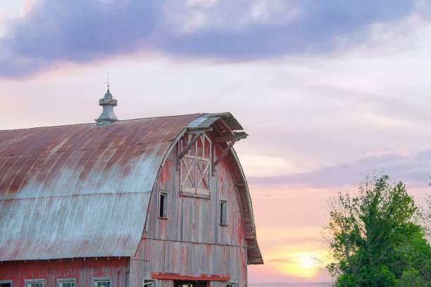 istock Old Weathered Red Barn at sunrise- Howard County, Indiana 2151954972