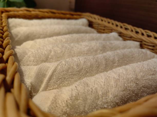 istock Folds towels on basket in washroom. 2151956238