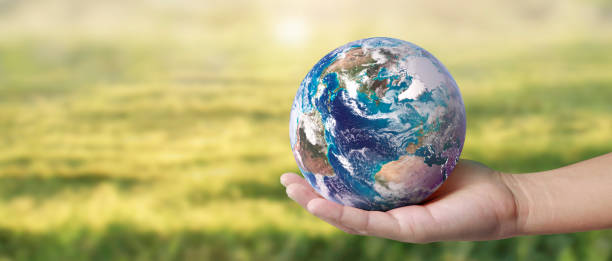 istock Globe ,earth in human hand, holding. Earth image provided by Nasa 2151956277