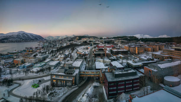 Winter cityscape covered with snow at night